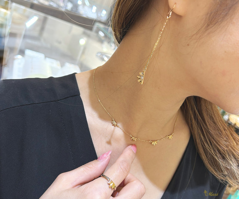 Naupaka earring necklace ring puton image